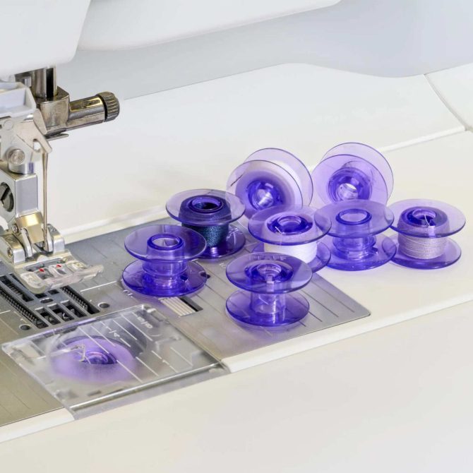 PFAFF® Bobbin Winder with Violet Bobbins Bundle - Image 3